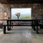 Custom designed Outdoor table and bench seating in ebonised Jarrah. Coastal Property Injidup Western Australia