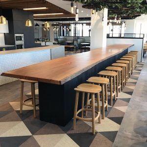 DWER Joondalup, Western Australia. In collaboration with MKDC. Staff Dining Table. Storm Fallen Wandoo with Live edge detail. Scorched Jarrah Base. 8000 x 1000 x 950mm