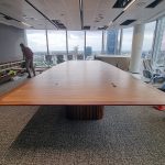 Custom Meeting Table L6700 x W2500 in Australian Blackwood with integrated power and data. Compliant with strict human factors guidelines. Location- One The Esplanade, Elizabeth Quay, Perth Western Australia