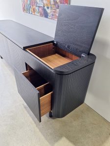 Custom Credenza. Handcrafted in Ebonised American Walnut for a private client in North Fremantle, Western Australia. A dedicated compartment for record player with lift up lid on damper mechanism. Drawer below for record storage and reticulated power throughout the cabinet.