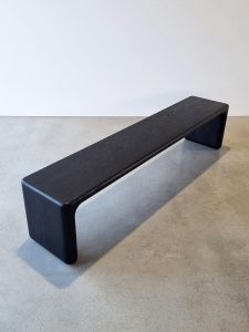A Voluptuous Bench seat, Coffee table and console table. Limited Edition. Crafted from thick milled, ancient Jarrah slabs with an ebonised finish. Bench seat pictured 2000 x 400 x 450mm